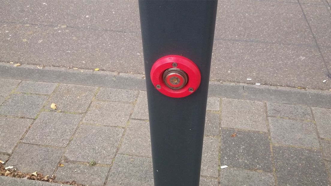 De mysterieuze rode knop.