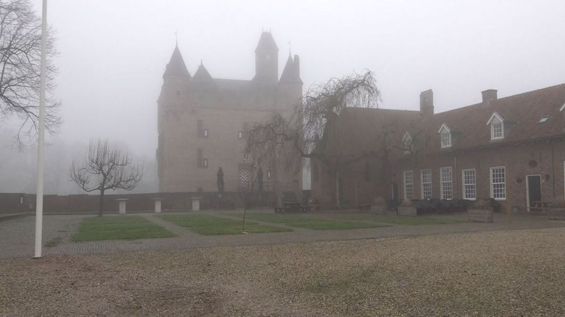 View of Castle Doornenburg in the fog.