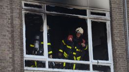 Haagse portiekwoning uitgebrand